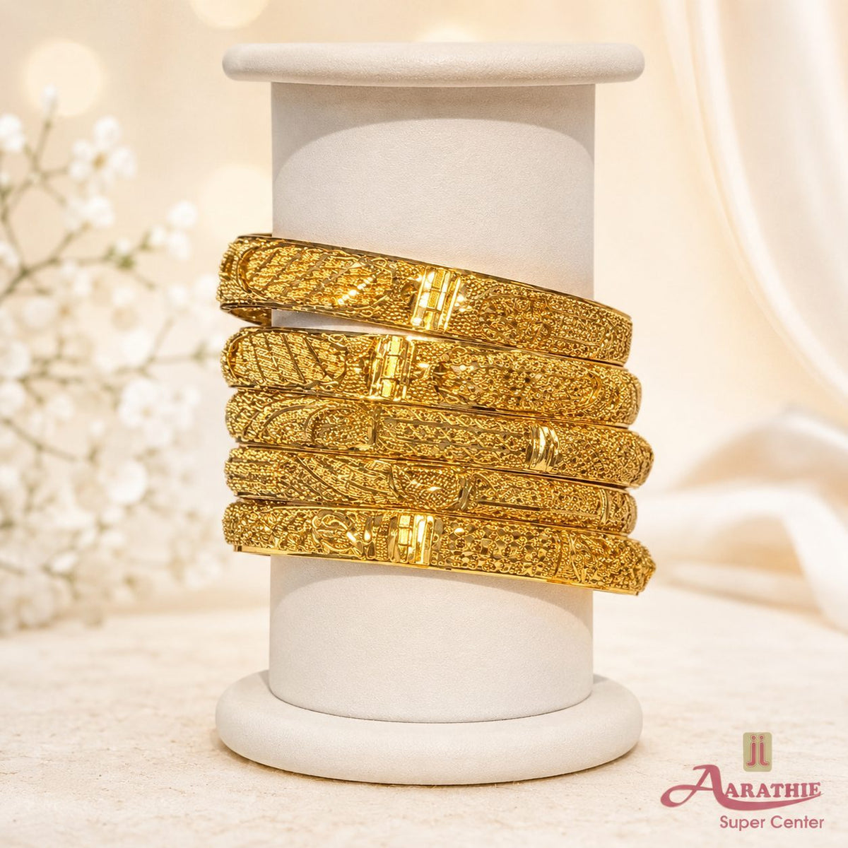 Gold bangles set at Aarathie Super Centre