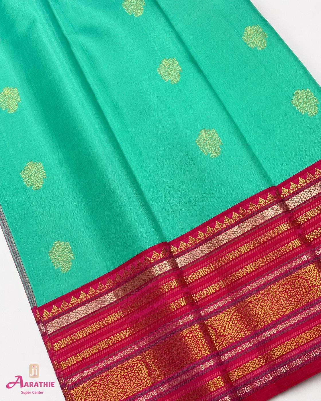 Turquoise Silk Saree with Pink Border