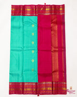 Turquoise Silk Saree with Pink Border